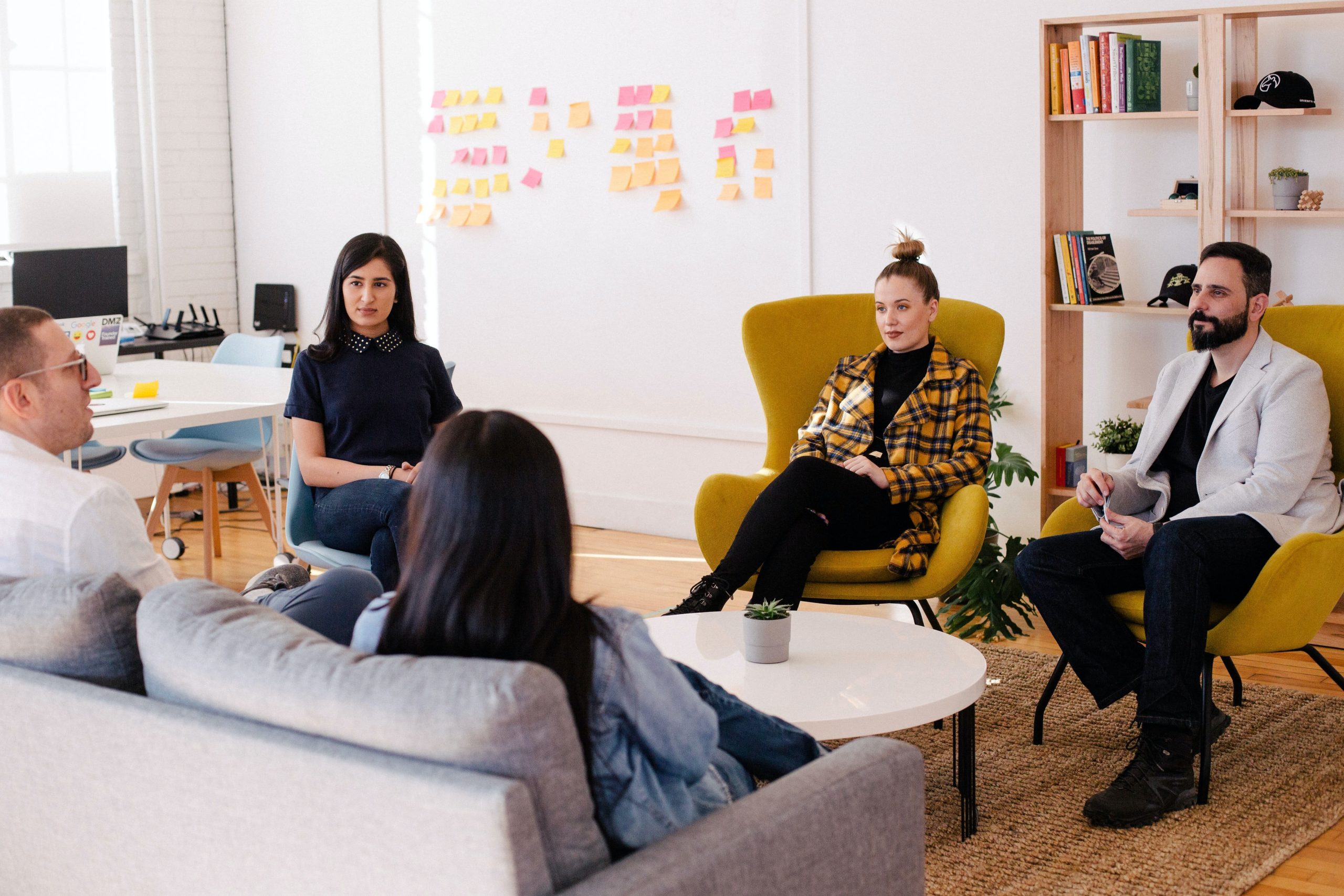 A stock photo of a small group of people having a meeting.